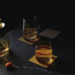 ASA Selection Onderzetters - Soft Leather - Cork - 10 X 10 Cm - 4 Stuks 5 ASA Selection Onderzetters - Soft Leather - Cork - 10 X 10 Cm - 4 Stuks -Alessi Verkoopwinkel Coaster Soft Leather Glas Amber 1